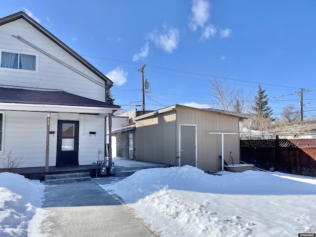 exterior space featuring a storage unit