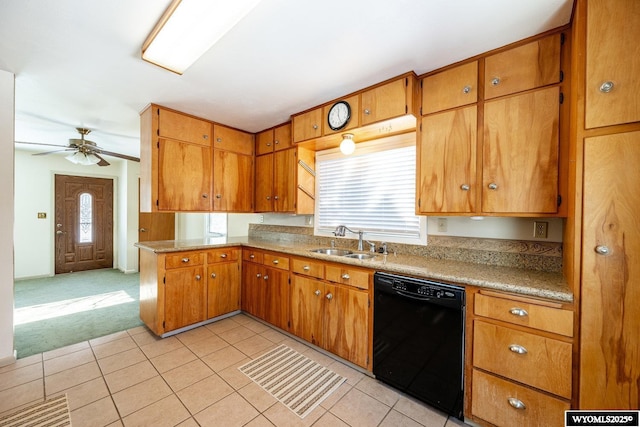 kitchen with black dishwasher, sink, light colored carpet, and ceiling fan