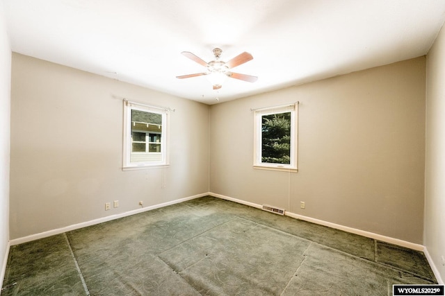 unfurnished room featuring ceiling fan