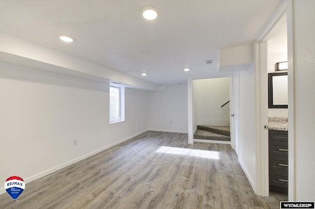 basement with light wood-type flooring