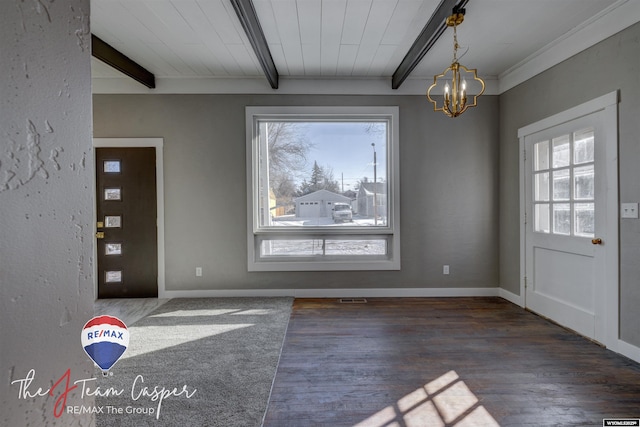 entryway featuring dark hardwood / wood-style flooring, a chandelier, and beamed ceiling