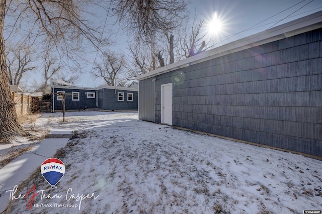 view of snow covered property