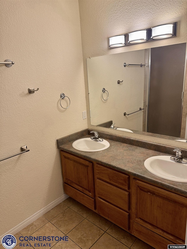 bathroom featuring vanity and tile patterned floors