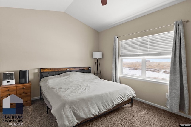 carpeted bedroom featuring vaulted ceiling and ceiling fan