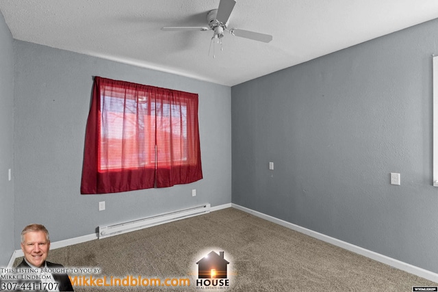 carpeted spare room featuring a baseboard radiator, a textured ceiling, and ceiling fan