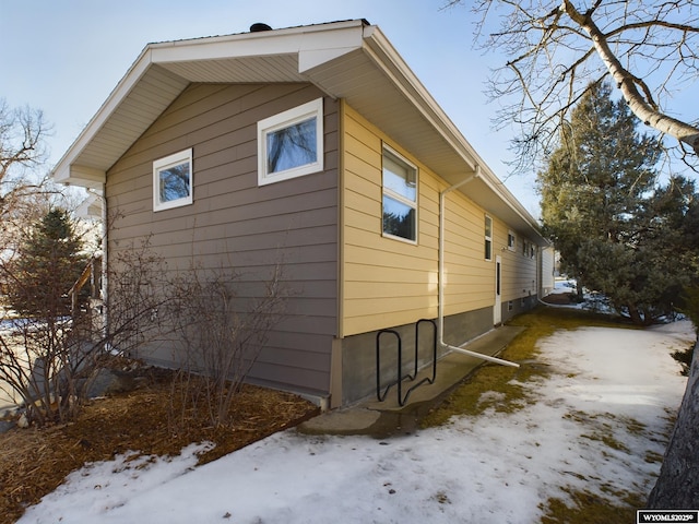 view of snow covered property