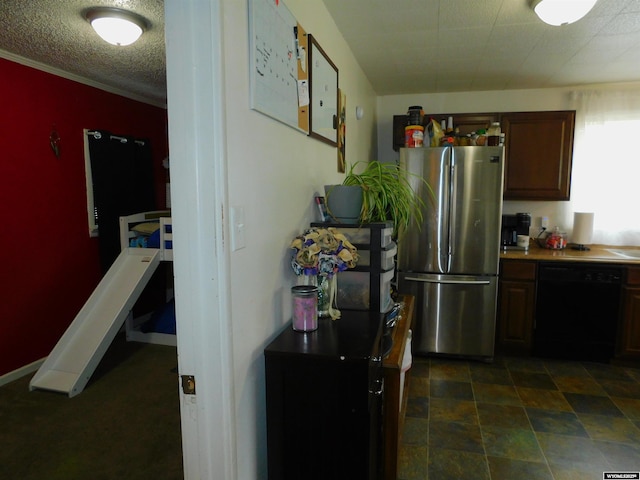 kitchen with dark brown cabinets, black dishwasher, a textured ceiling, and stainless steel refrigerator