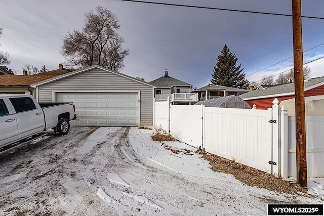 view of snow covered garage