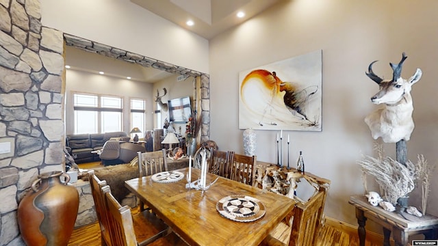 dining area with hardwood / wood-style floors