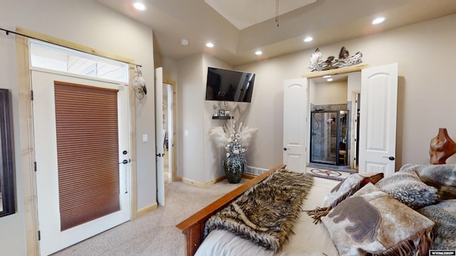 bedroom featuring light colored carpet