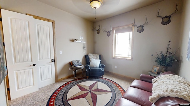 living area with carpet