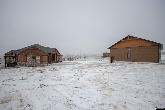 view of yard layered in snow