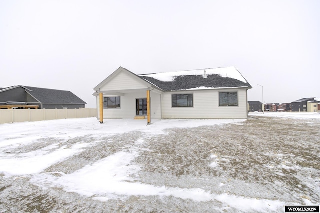 view of snow covered property