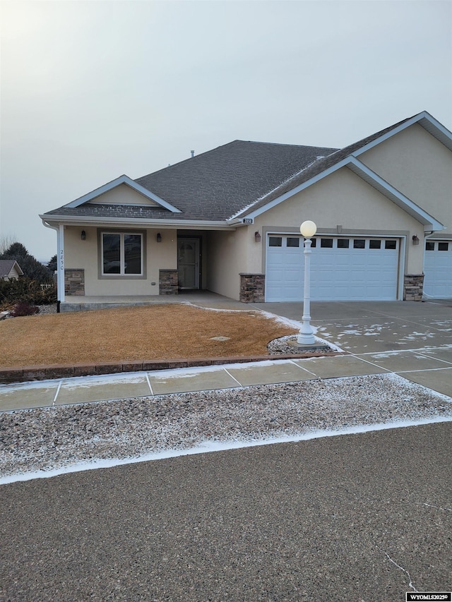 ranch-style home with a garage