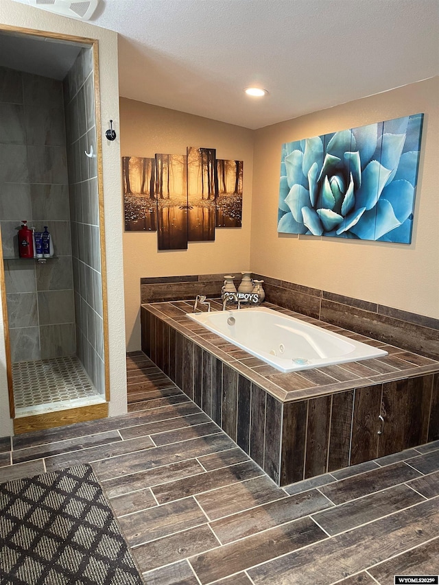 bathroom with independent shower and bath