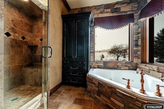 bathroom with shower with separate bathtub