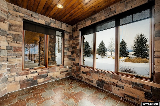 interior space featuring wood ceiling