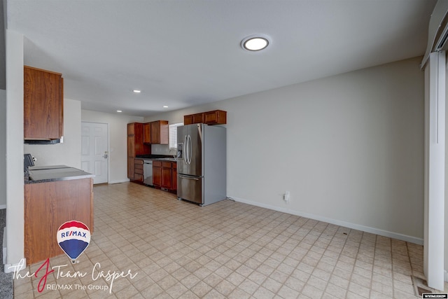 kitchen featuring appliances with stainless steel finishes and sink