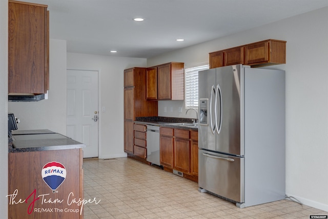 kitchen with appliances with stainless steel finishes and sink