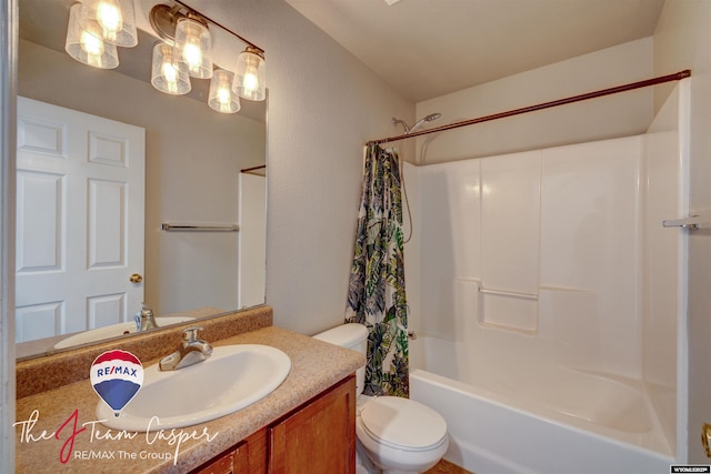 full bathroom with vanity, toilet, and shower / bath combo with shower curtain