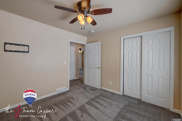 unfurnished bedroom with ceiling fan, a closet, and light colored carpet