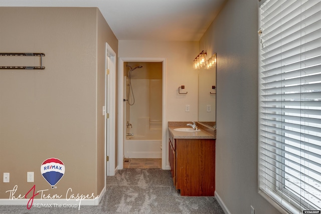 bathroom with vanity and shower / washtub combination