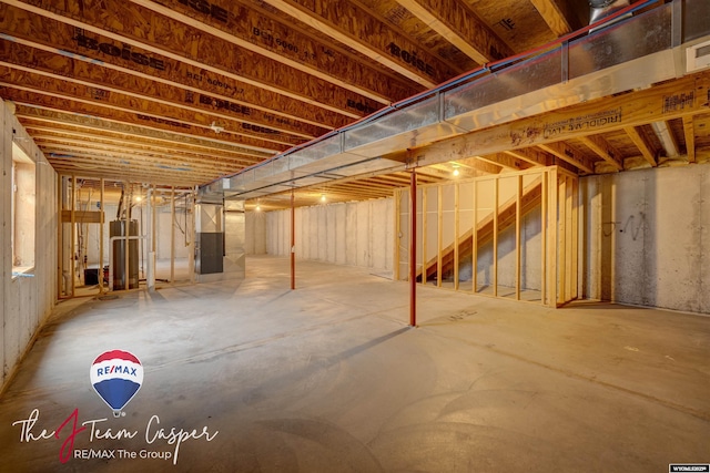 basement with heating unit and gas water heater