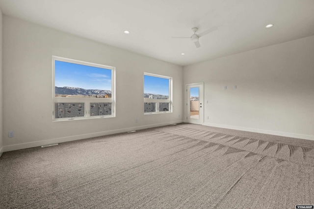 unfurnished room featuring ceiling fan, recessed lighting, carpet, and baseboards