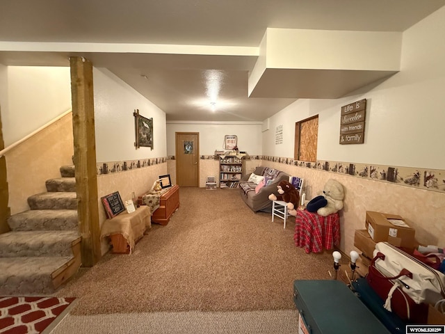 rec room featuring tile walls and carpet floors