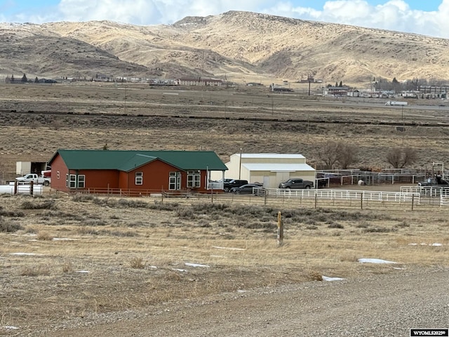 property view of mountains featuring a rural view