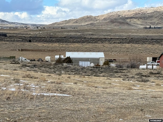 property view of mountains with a rural view