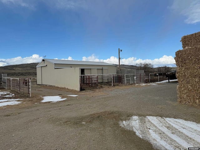 exterior space featuring an outbuilding