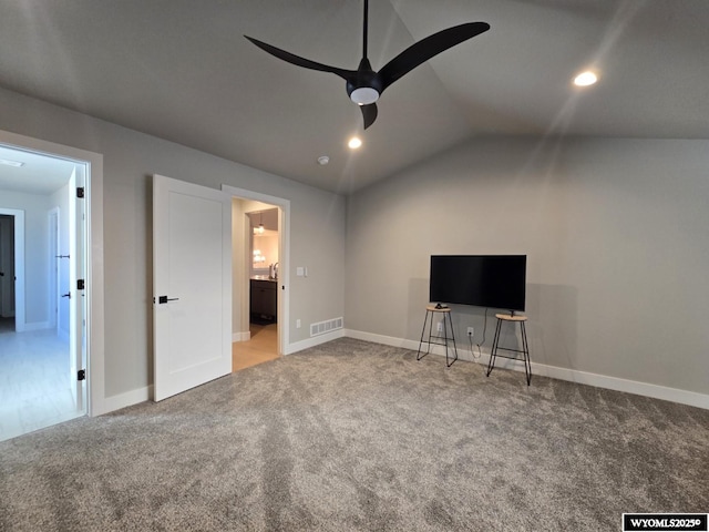 unfurnished bedroom with recessed lighting, visible vents, carpet flooring, vaulted ceiling, and baseboards