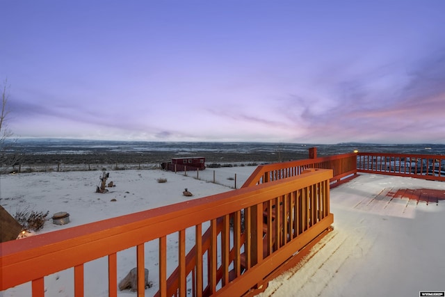 view of snow covered deck