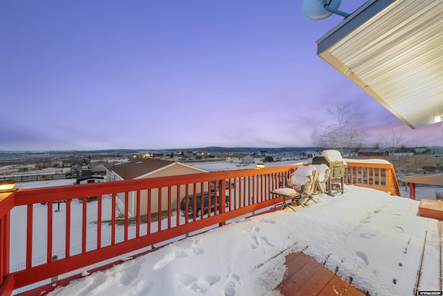 view of snow covered deck