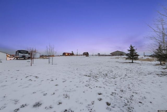 view of yard covered in snow