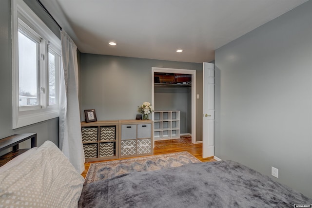 bedroom with light hardwood / wood-style floors