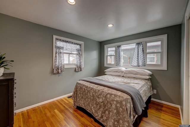 bedroom featuring light wood-type flooring