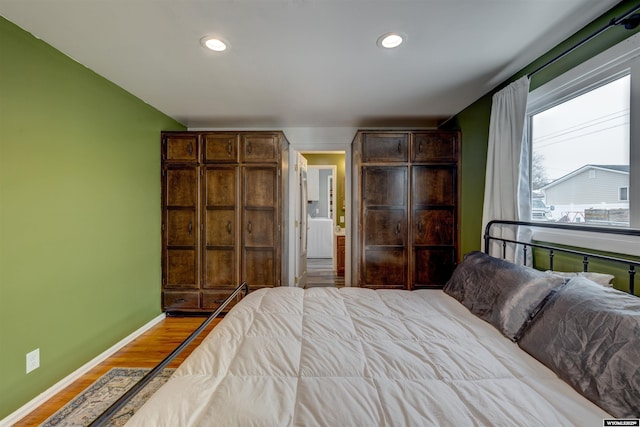 bedroom with light wood-type flooring