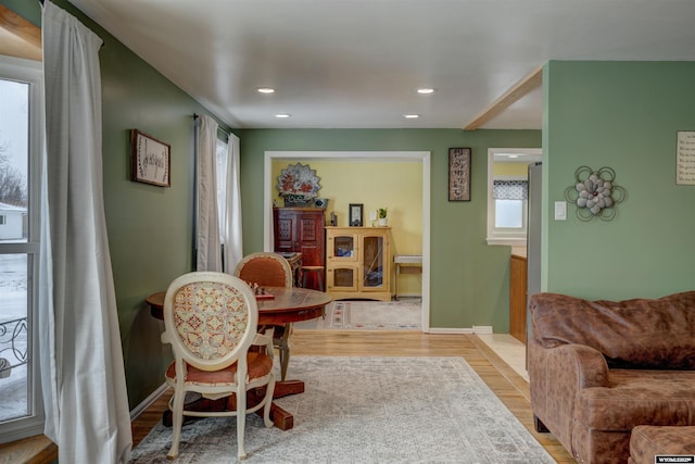 interior space featuring light wood-type flooring and a healthy amount of sunlight