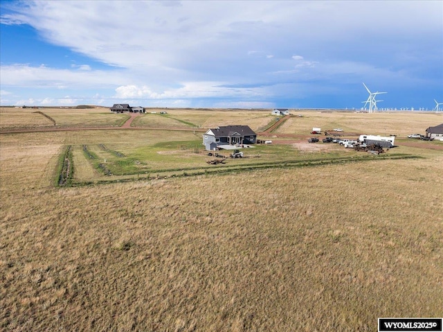 birds eye view of property featuring a rural view