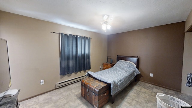 bedroom with baseboards and baseboard heating