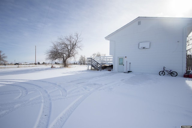 view of snow covered property