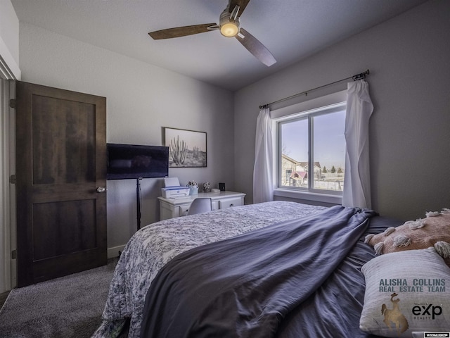 bedroom with dark carpet and ceiling fan