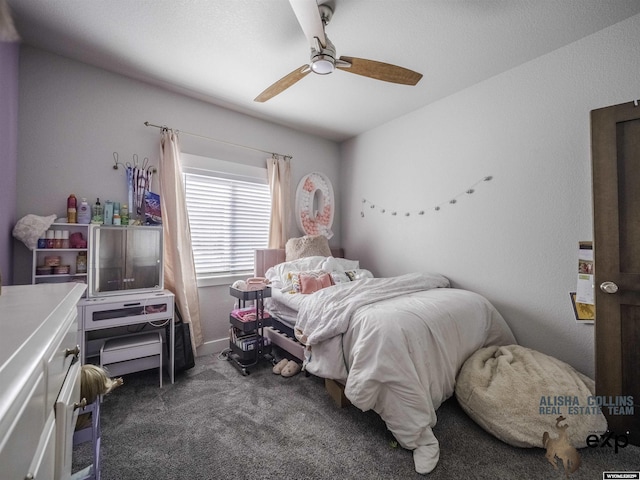 bedroom with dark carpet and ceiling fan