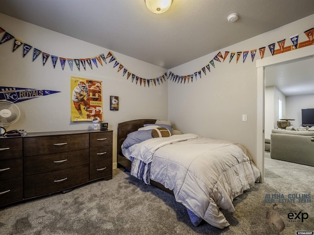 bedroom with carpet flooring and vaulted ceiling