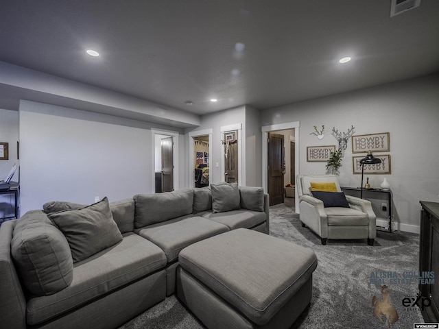 carpeted living room with recessed lighting, visible vents, and baseboards