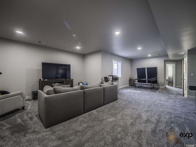 living room with baseboards, dark carpet, and recessed lighting