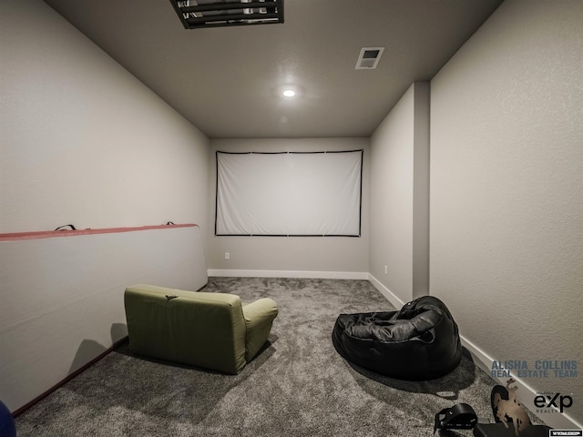 cinema featuring carpet flooring, visible vents, and baseboards