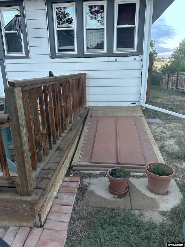 details featuring a bulkhead entry and fence